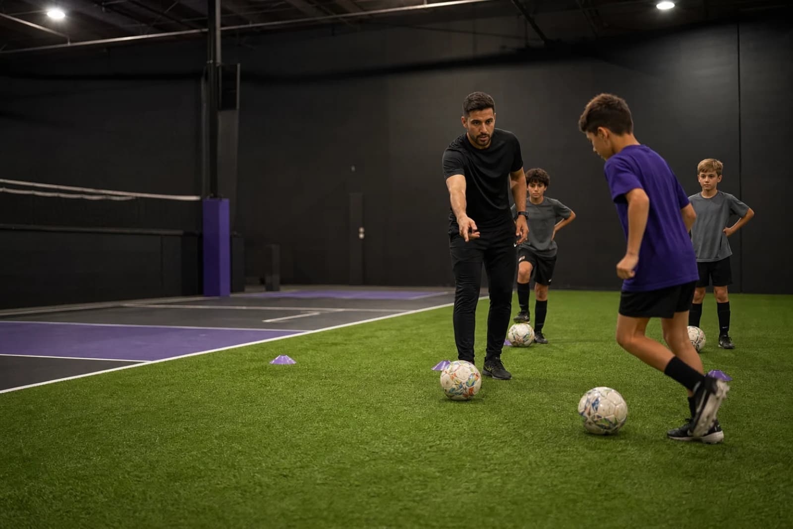 Original concept image of a coach leading indoor small-space training